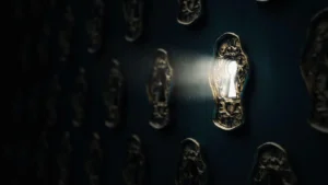 A glowing keyhole in an ornate brass lock, surrounded by multiple similar locks, with light streaming through.